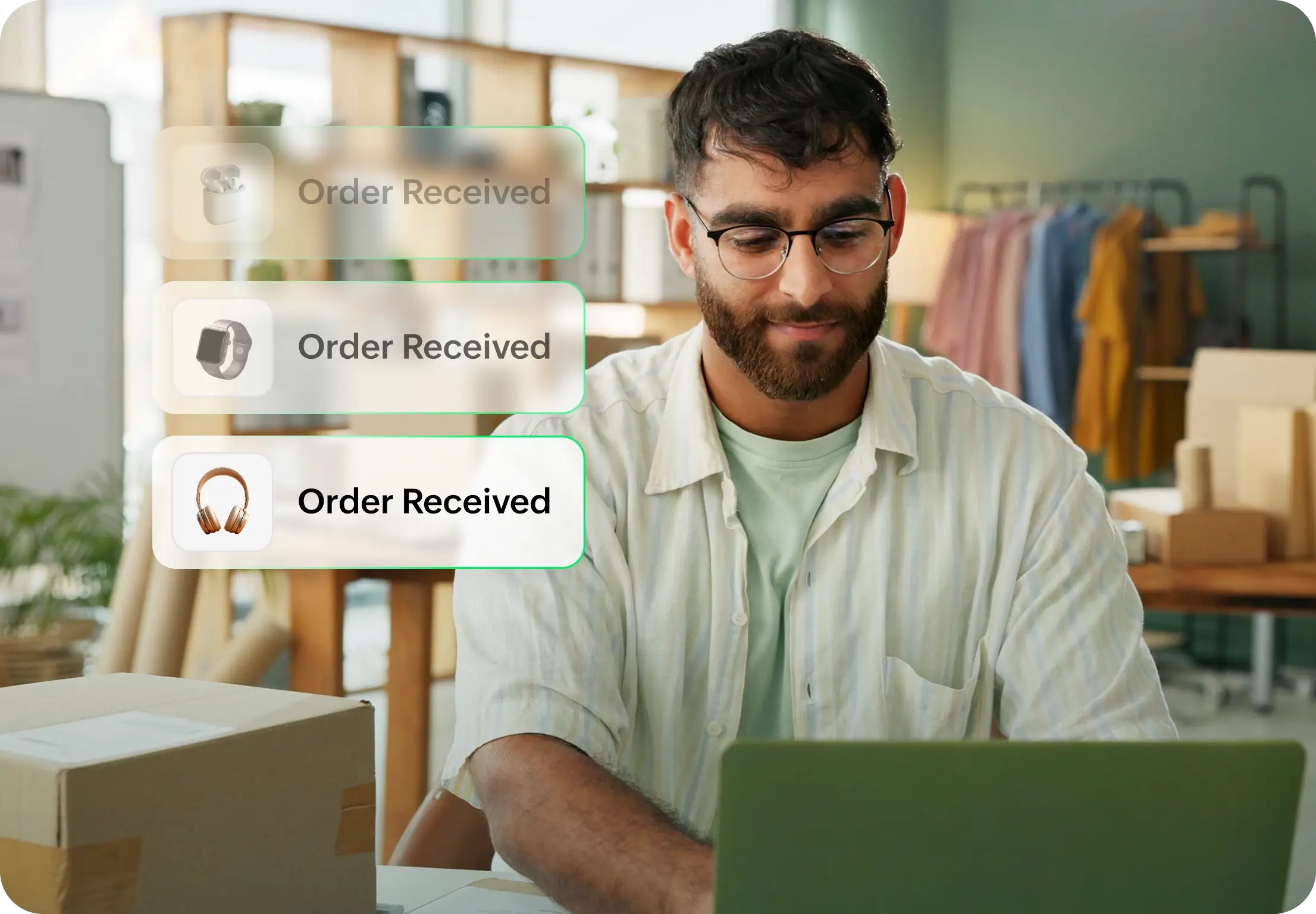 Man working on laptop with order notifications