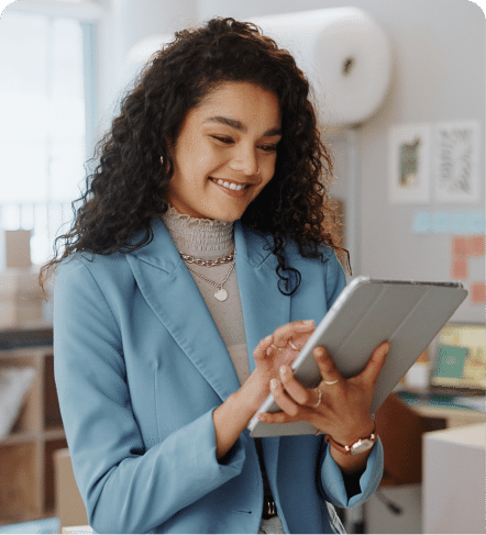 Professional using a tablet in an office